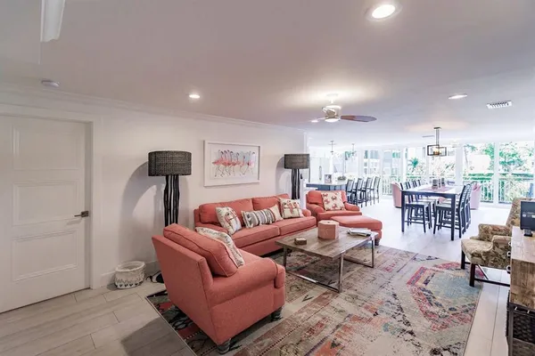 a living room with furniture and a table