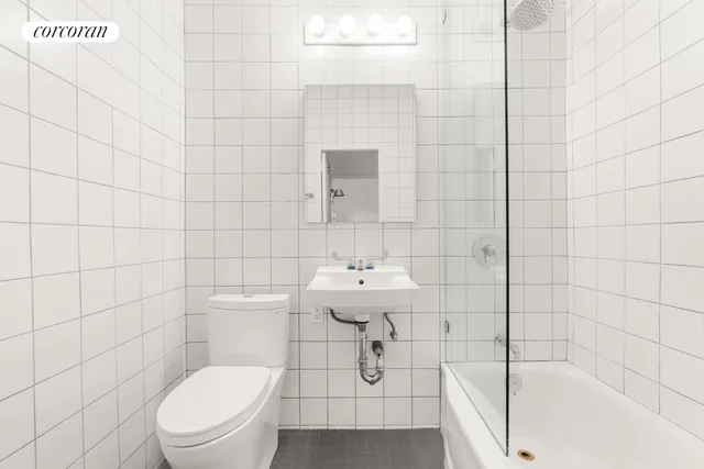 a kitchen with stainless steel appliances a refrigerator and a stove