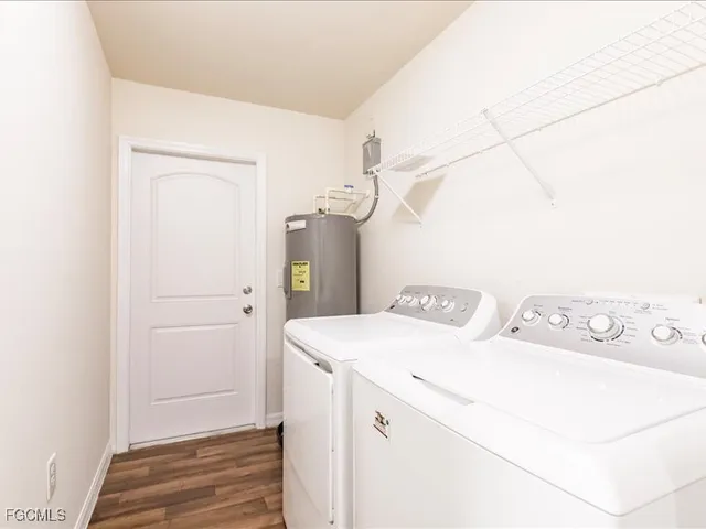 a utility room with dryer and washer