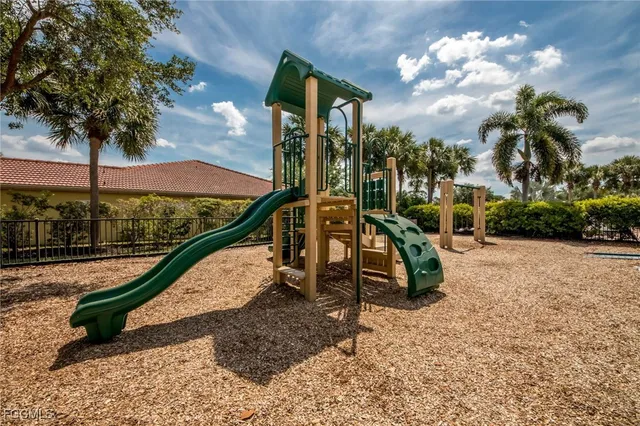 a view of a park with potted plants