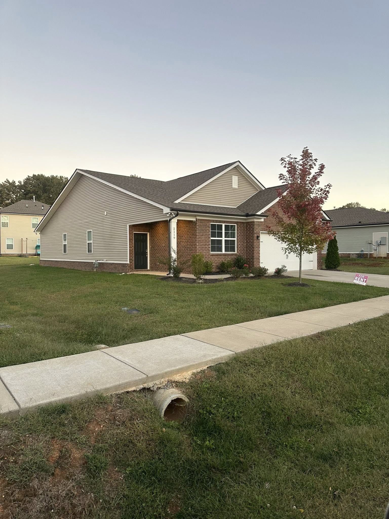 2119 Neill Lane White House, TN 37188 - Photo 2 of 16 a front view of a house with a garden