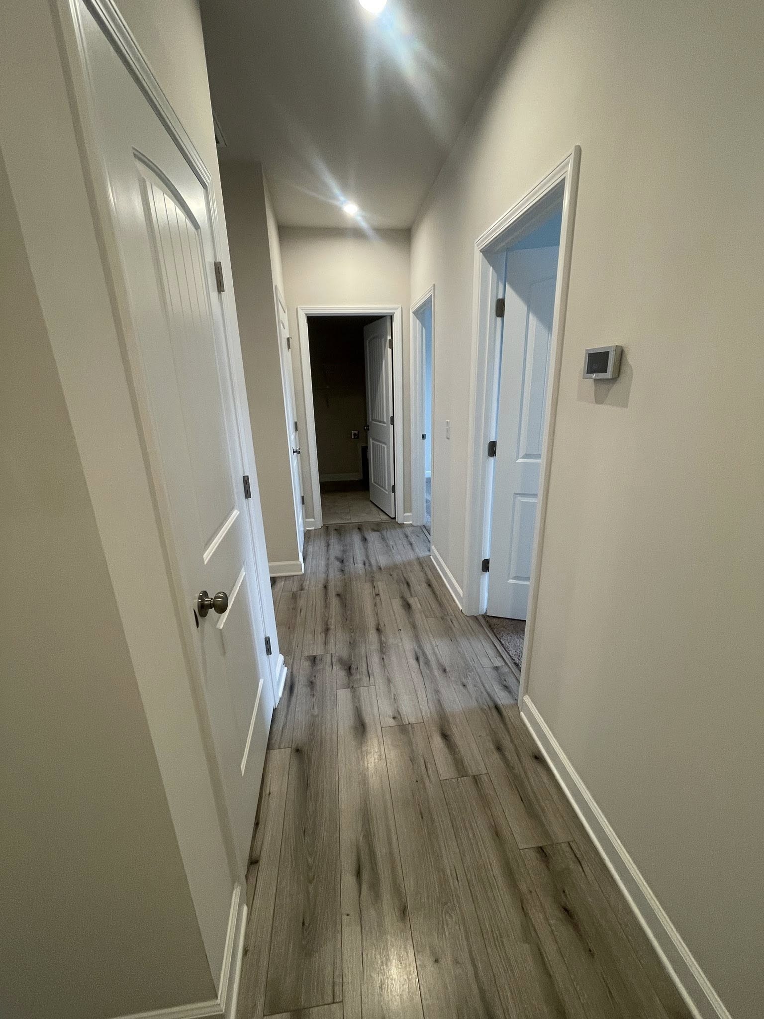 2119 Neill Lane White House, TN 37188 - Photo 8 of 16 a view of a livingroom with wooden floor and staircase