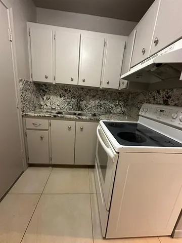 a view of a backyard with a house