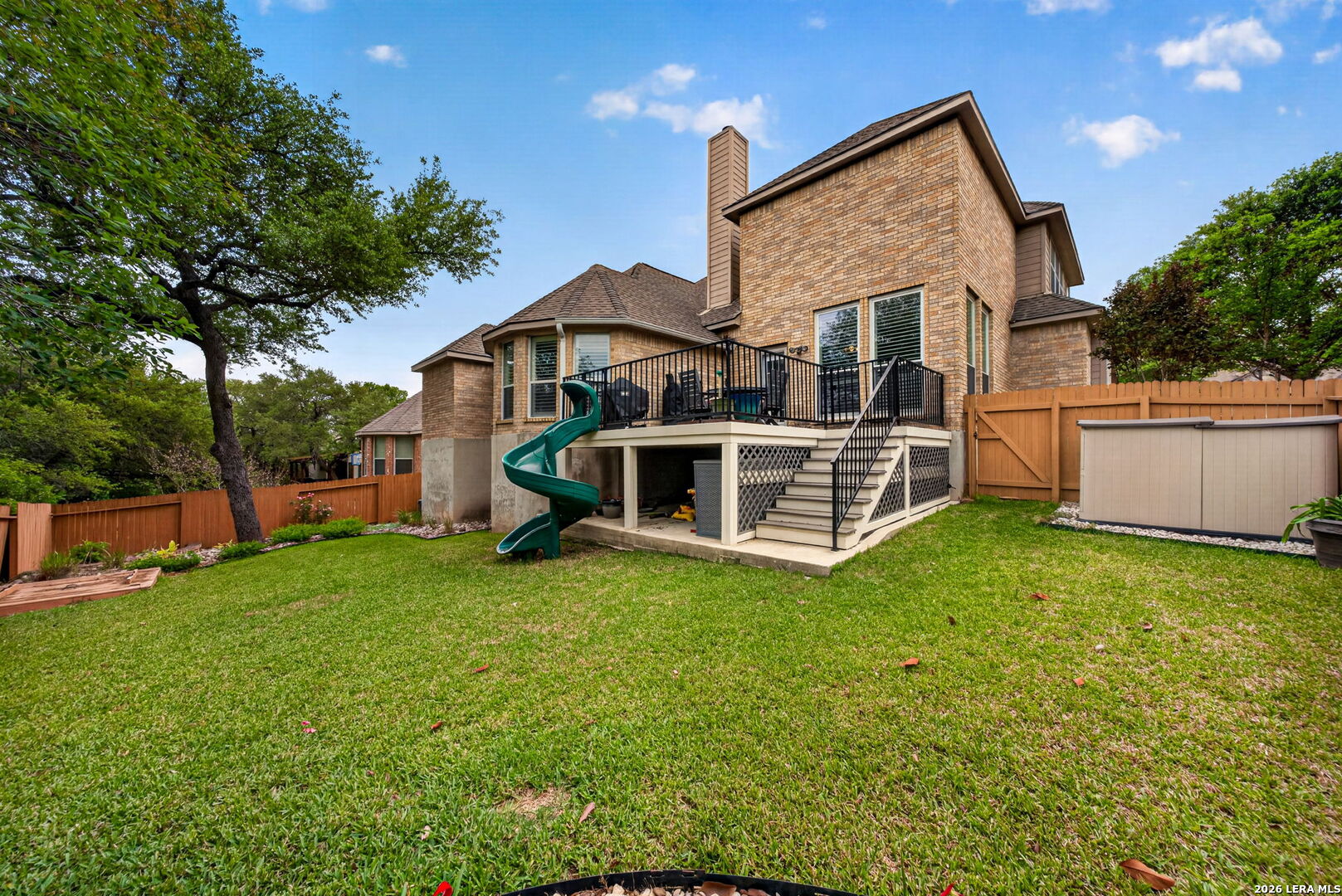 8715 Rancho De Taos Helotes, TX 78023 - Photo 2 of 40 a view of a house with a yard