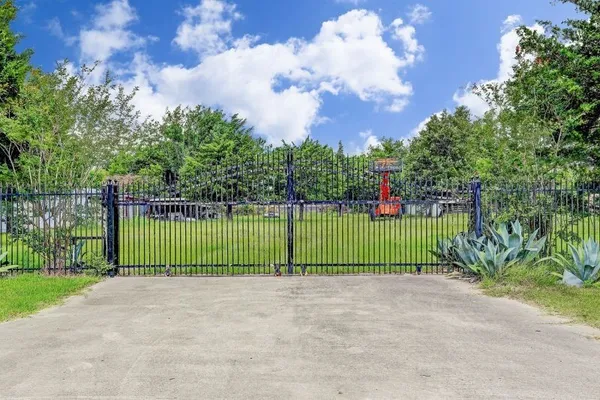 a view of a play ground in front of a house