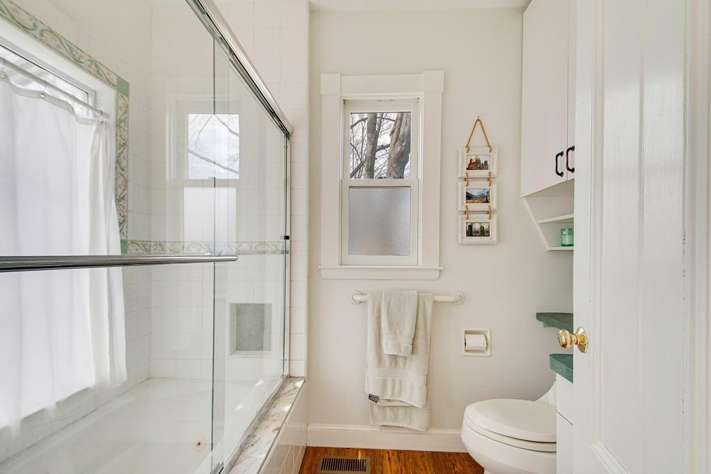 86 Pond Street Natick, MA 01760 - Photo 18 of 33 view of bathroom with a tub shower and a sink