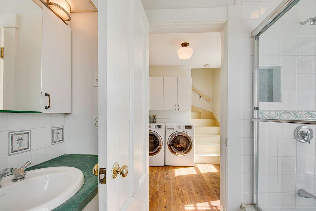 86 Pond Street Natick, MA 01760 - Photo 19 of 33 a bathroom with a sink and mirror