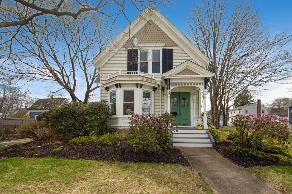 86 Pond Street Natick, MA 01760 - Photo 2 of 33 a front view of a house with garden
