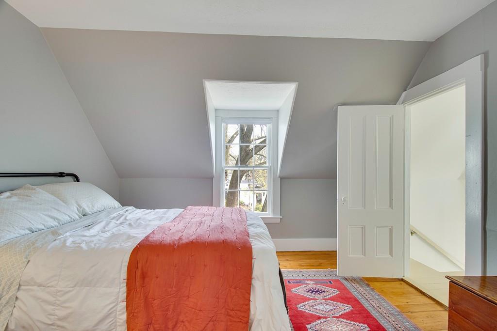 86 Pond Street Natick, MA 01760 - Photo 21 of 33 a bedroom with a bed and a window