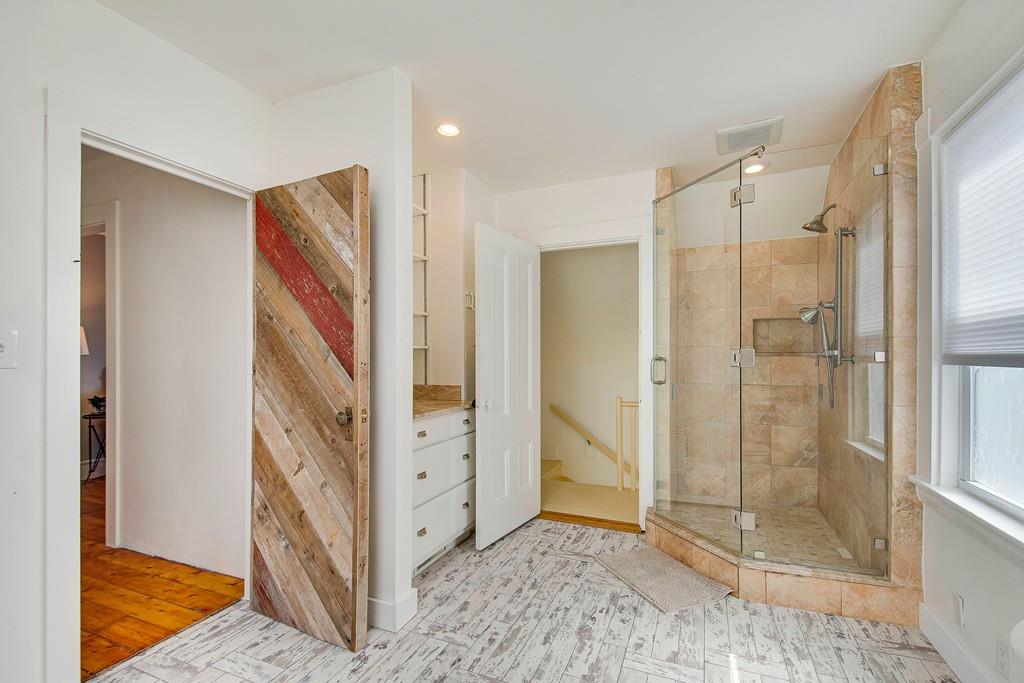 86 Pond Street Natick, MA 01760 - Photo 23 of 33 a view of a bathroom with shower
