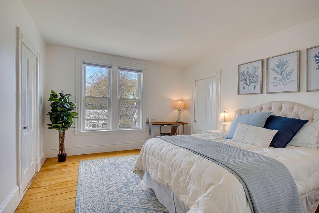 86 Pond Street Natick, MA 01760 - Photo 27 of 33 a bedroom with a bed and a window