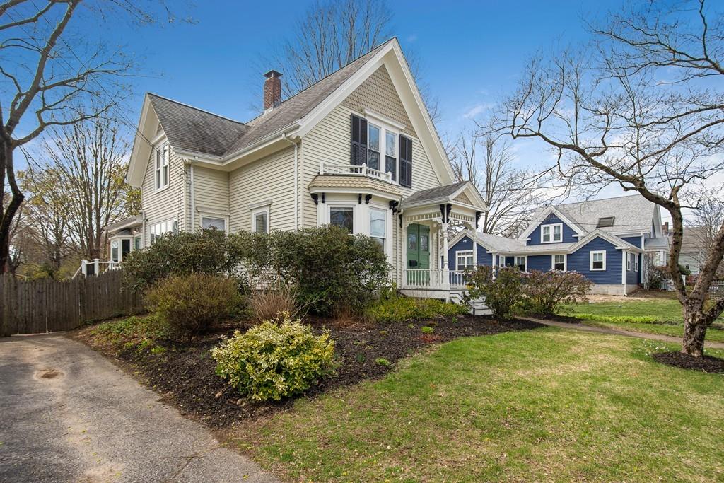 86 Pond Street Natick, MA 01760 - Photo 3 of 33 a front view of a house with garden