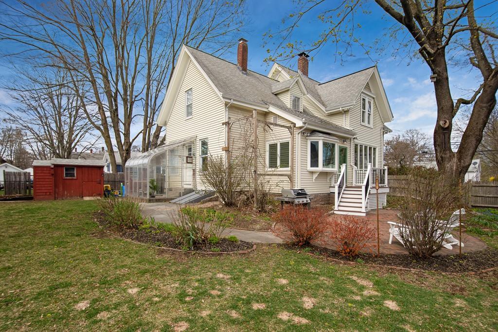 86 Pond Street Natick, MA 01760 - Photo 32 of 33 a view of a yard in front of a house