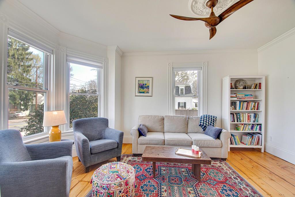 86 Pond Street Natick, MA 01760 - Photo 5 of 33 a living room with furniture and a rug