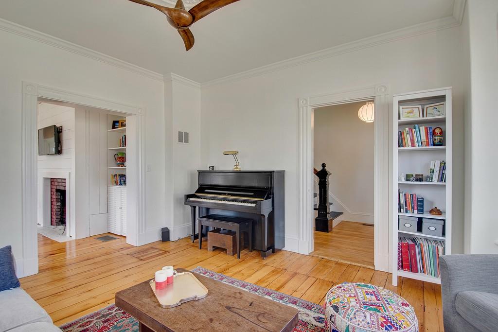 86 Pond Street Natick, MA 01760 - Photo 7 of 33 a bed room with a bed and a book shelf