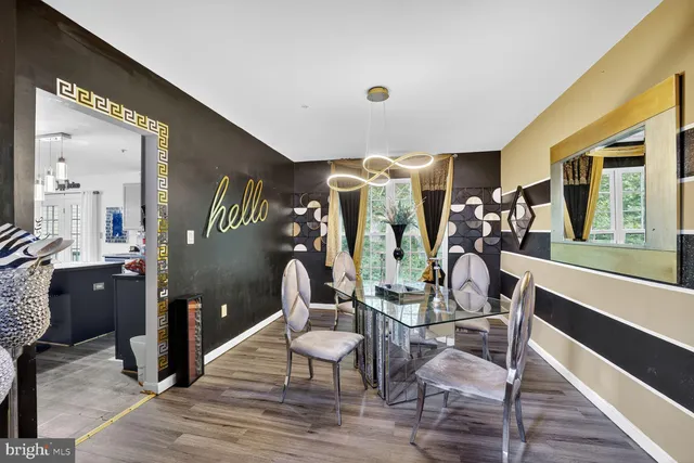 a view of a livingroom with furniture and windows