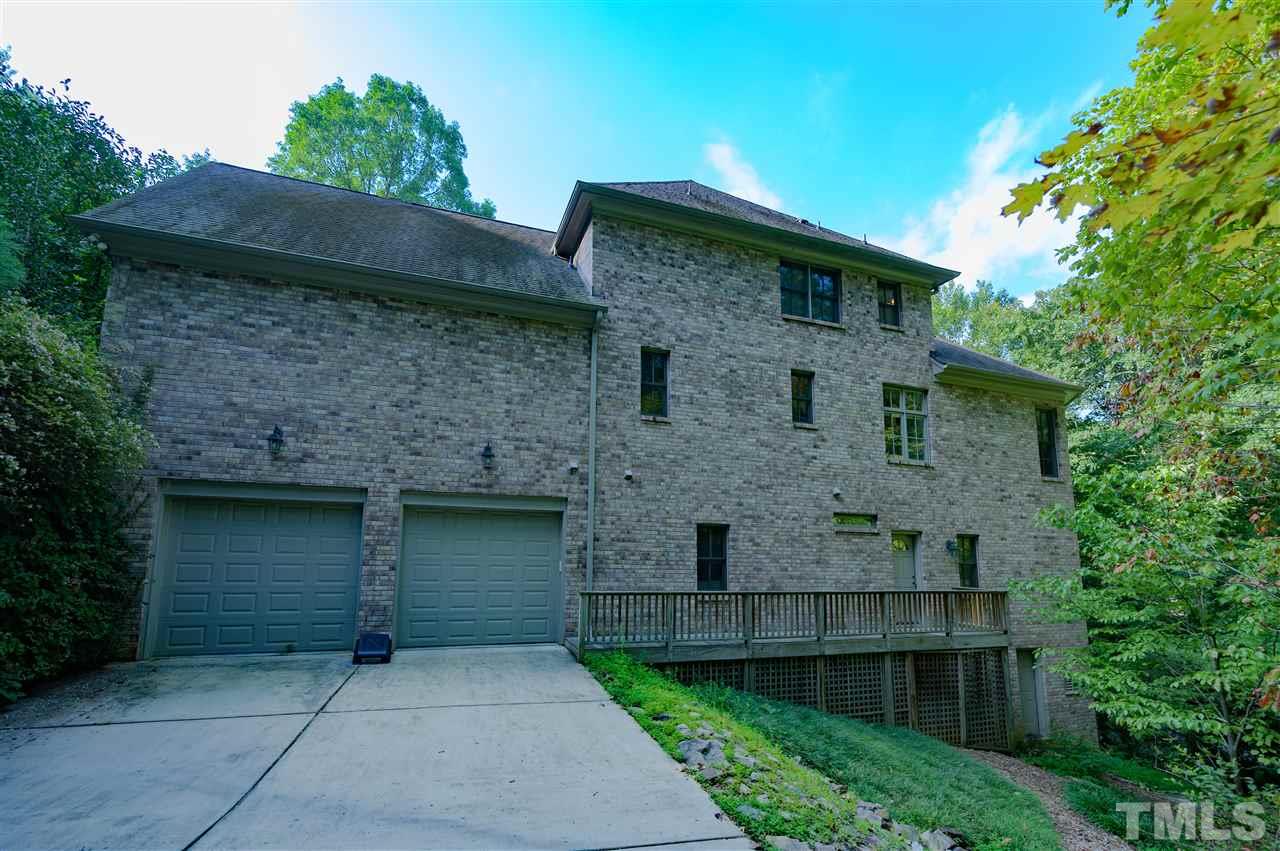 317 Homestead Drive Cary, NC 27513 - Photo 2 of 30 a front view of a house with a garden