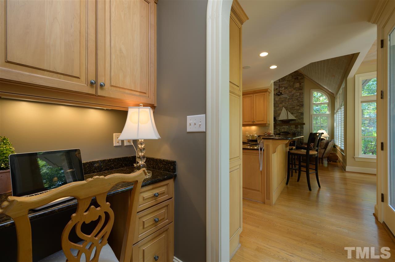 317 Homestead Drive Cary, NC 27513 - Photo 12 of 30 a kitchen with a sink and cabinets