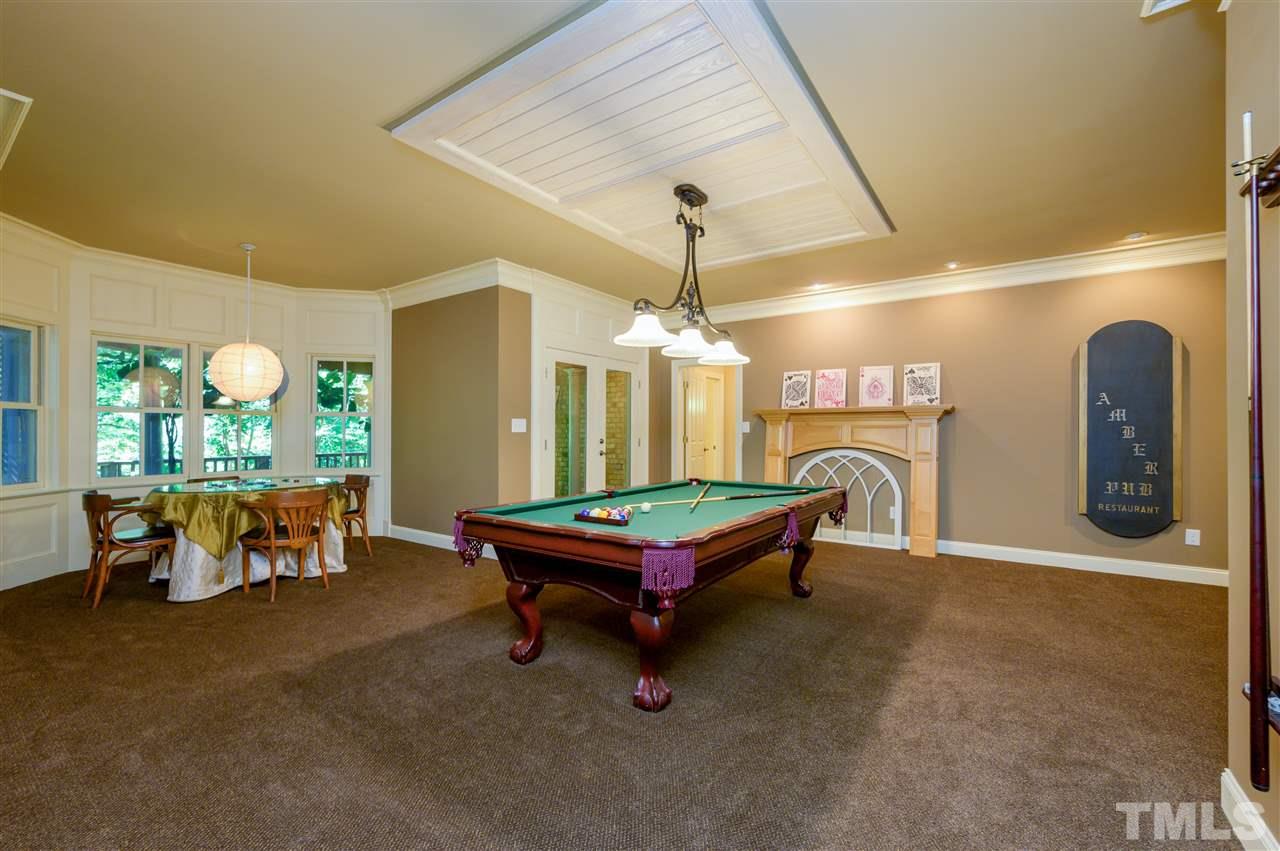 317 Homestead Drive Cary, NC 27513 - Photo 19 of 30 a room with pool table and windows