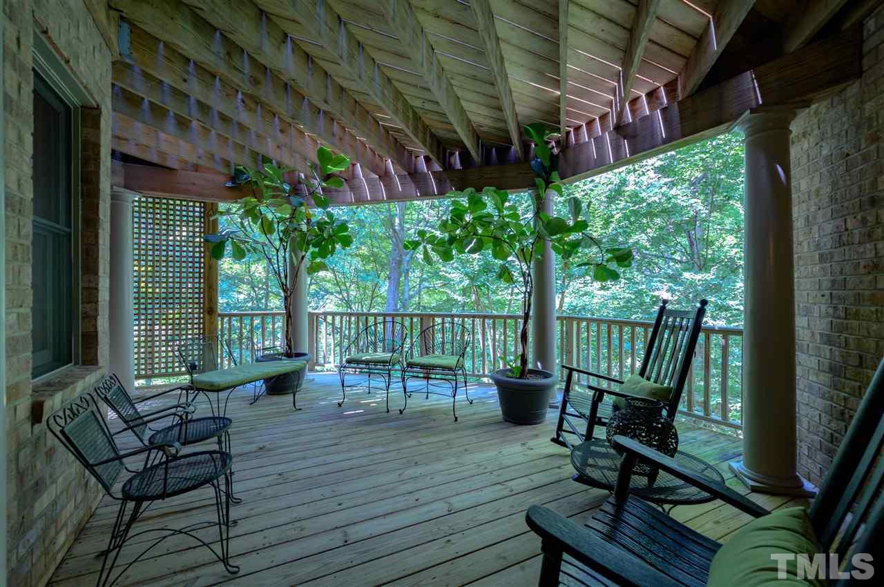 317 Homestead Drive Cary, NC 27513 - Photo 20 of 30 a view of a porch with furniture