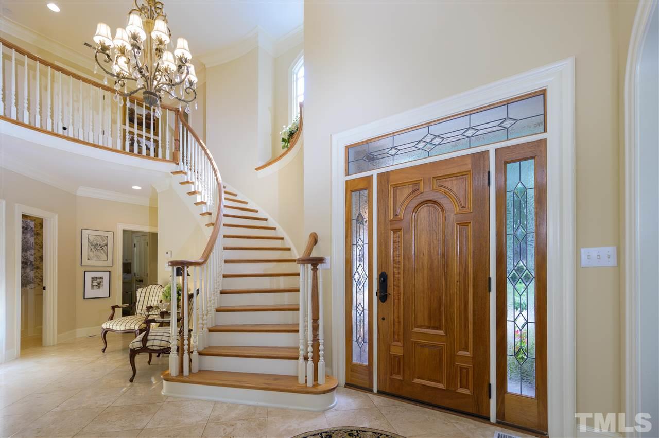 317 Homestead Drive Cary, NC 27513 - Photo 3 of 30 a view of a hallway with stairs and stairs