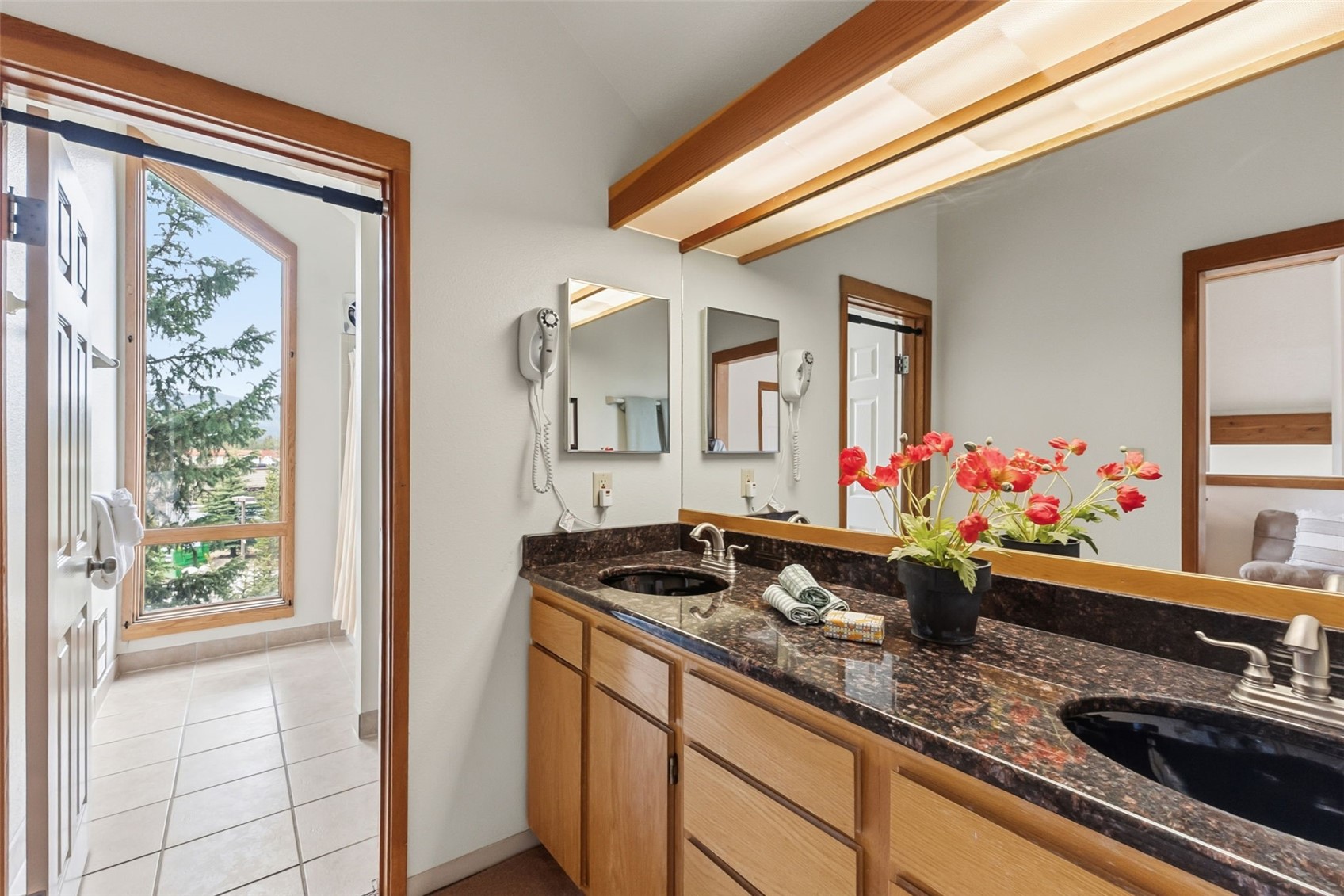 30 Tennis Club Road, Unit 1608 Keystone, CO 80435 - Photo 16 of 29 a kitchen counter top space with granite countertop a sink stainless steel appliances and cabinets