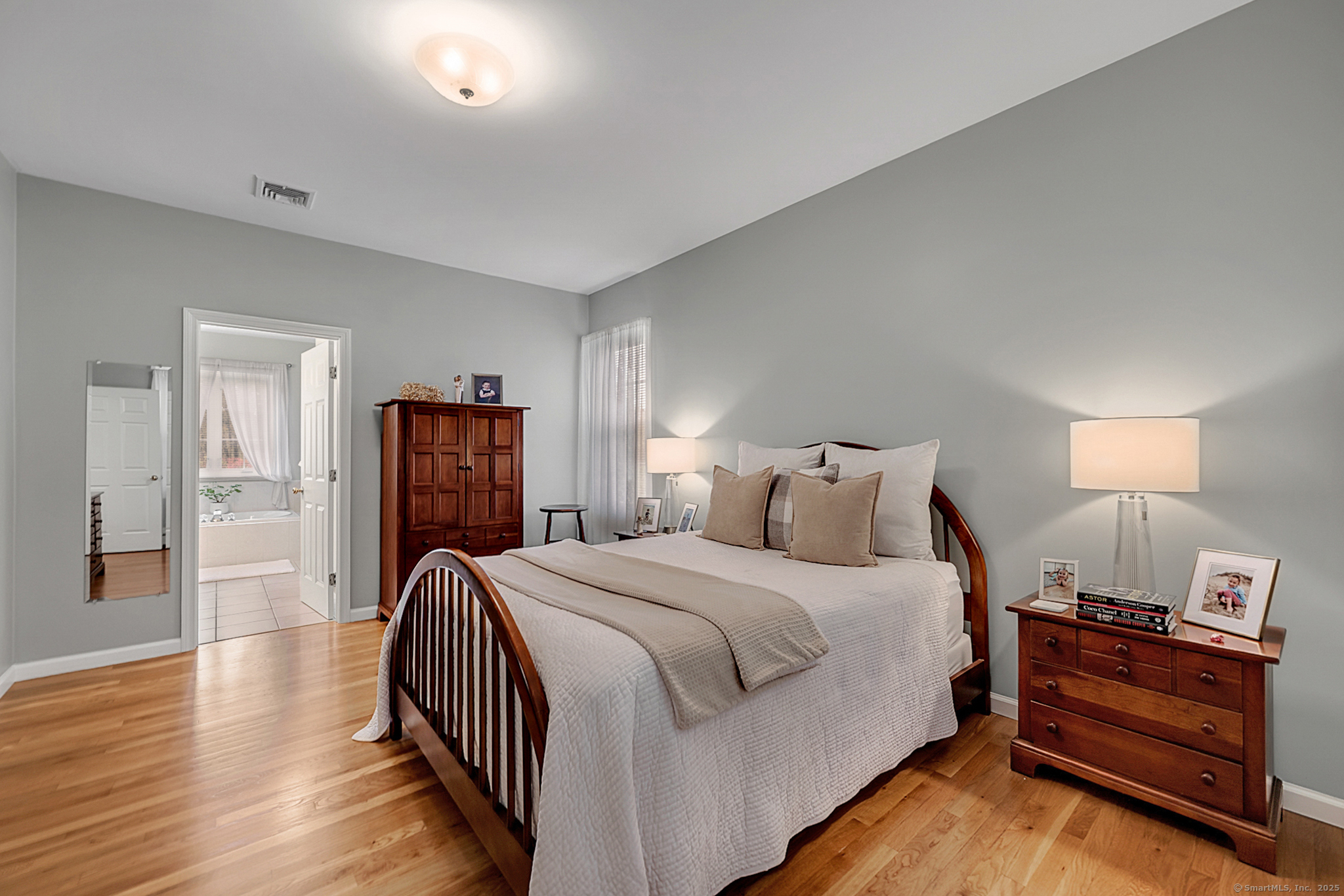 20 Cowles Road Bethlehem, CT 06751 - Photo 32 of 36 a bedroom with bed and wooden floor