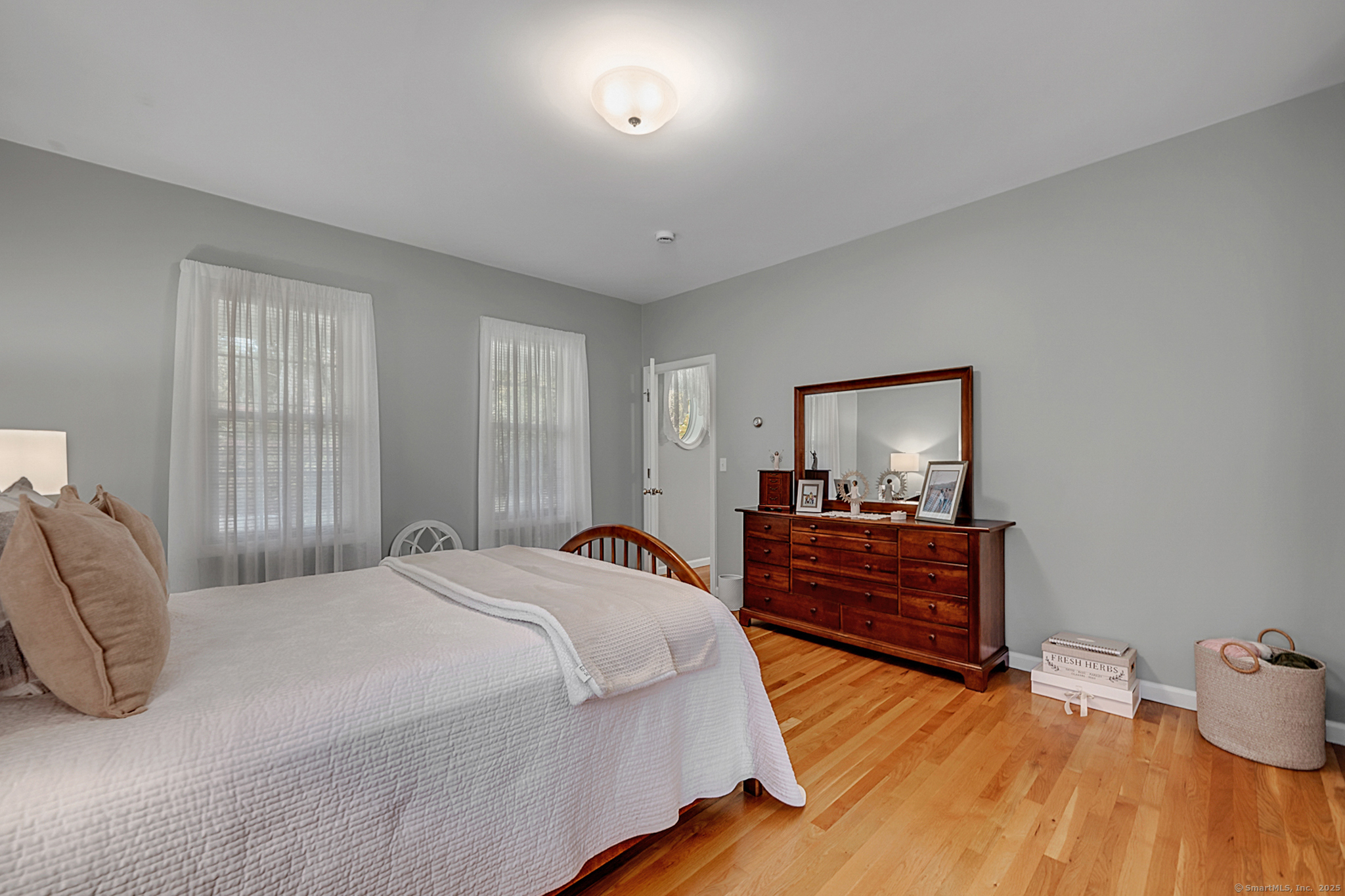 20 Cowles Road Bethlehem, CT 06751 - Photo 36 of 36 a bedroom with a bed and wooden floor