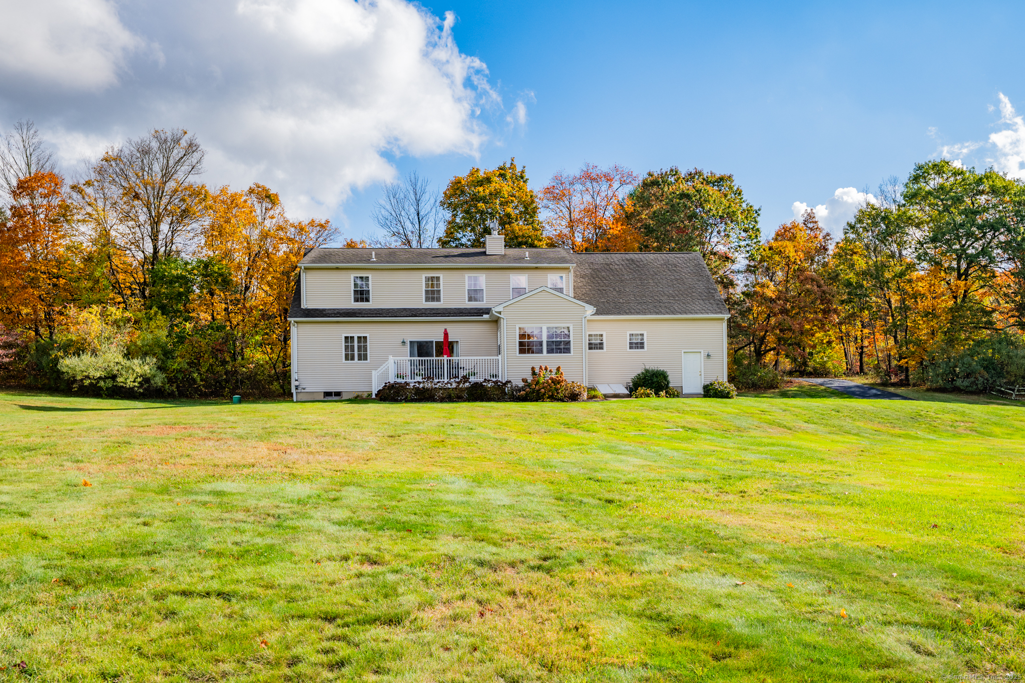 20 Cowles Road Bethlehem, CT 06751 - Photo 6 of 36 a front view of house with an outdoor space and seating