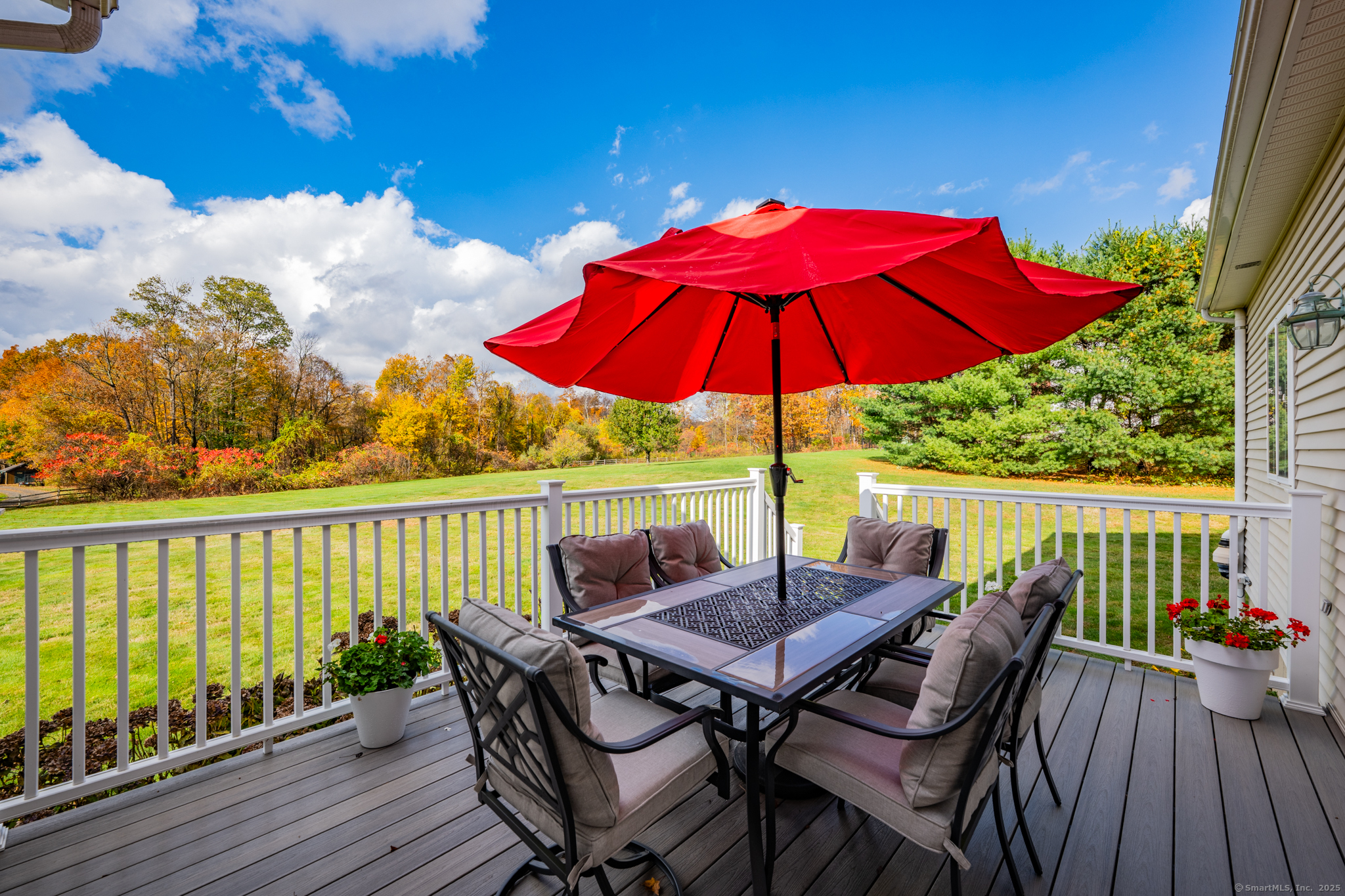 20 Cowles Road Bethlehem, CT 06751 - Photo 8 of 36 a view of balcony with outdoor seating and wooden floor