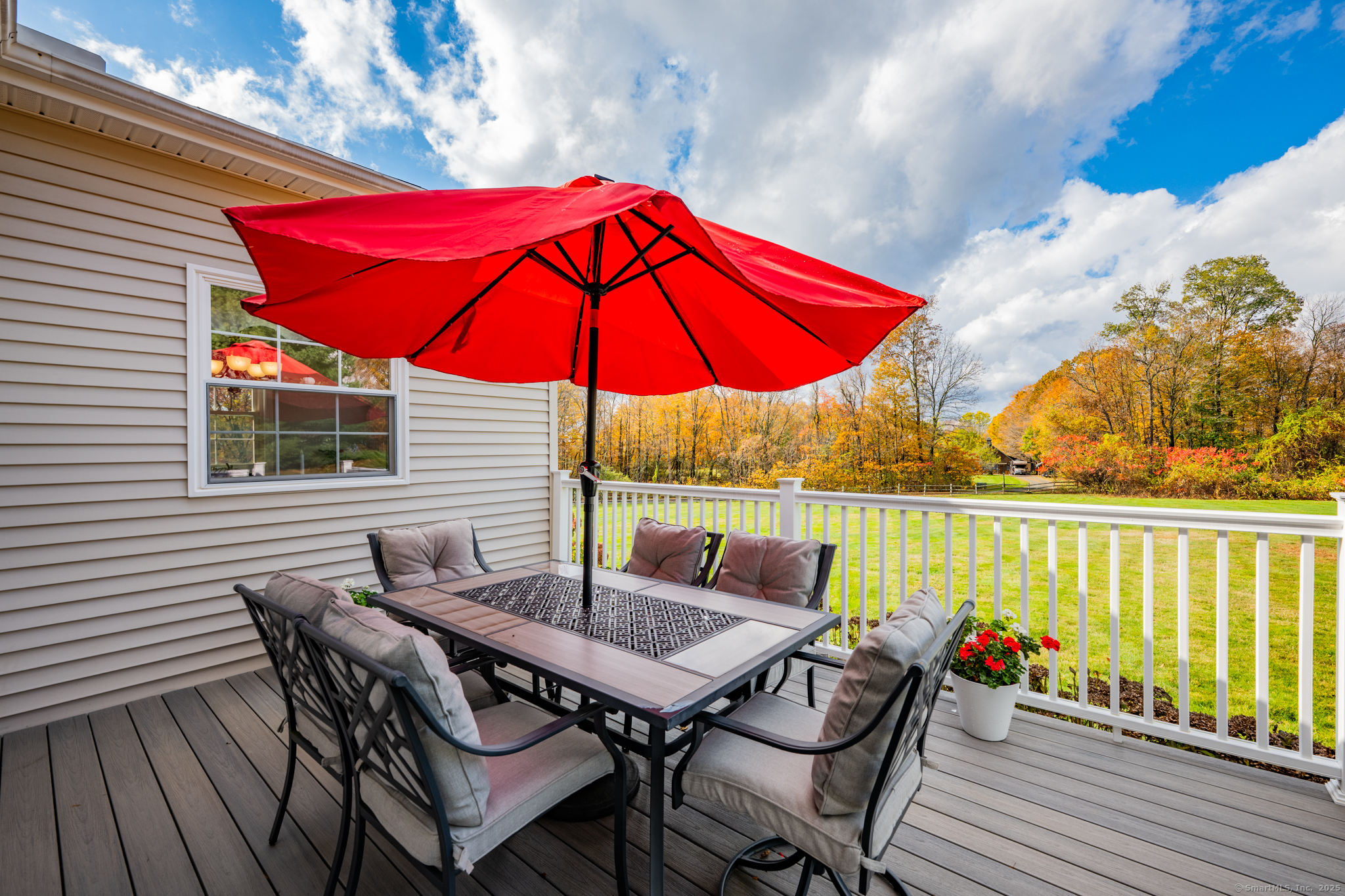 20 Cowles Road Bethlehem, CT 06751 - Photo 9 of 36 a view of balcony with outdoor seating and wooden floor