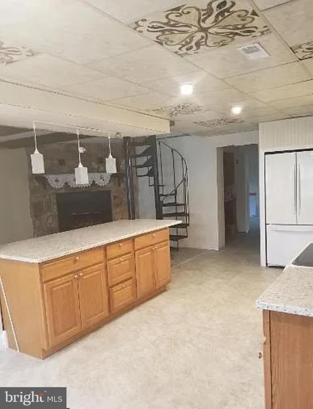 230 East High Street Glassboro, NJ 08028 - Photo 3 of 11 a spacious bathroom with a granite countertop sink and a mirror