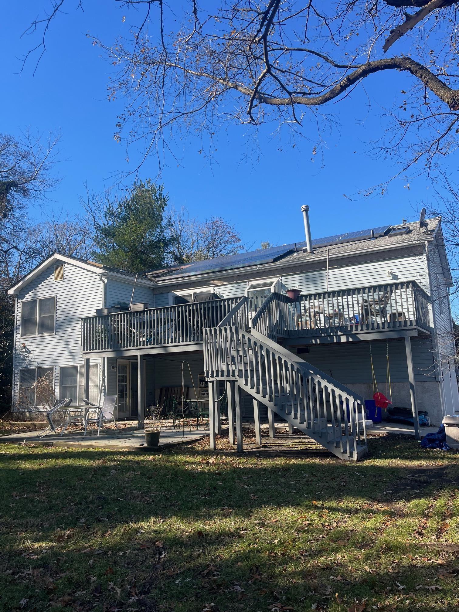 6 Abbey Road Somers Point, NJ 08244 - Photo 6 of 6 a view of a house with a yard