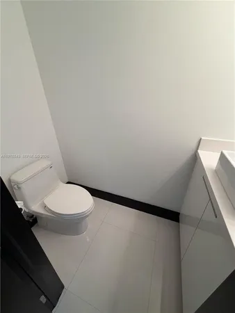 a view of parking garage with cars