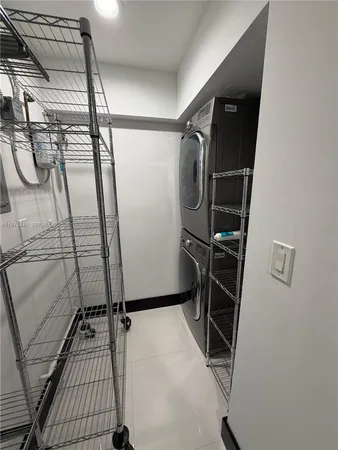 a view of a swimming pool with a yard