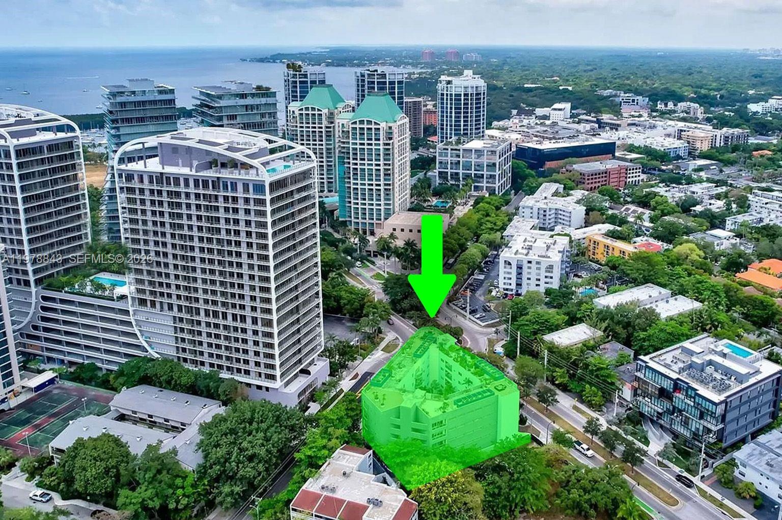 2699 Tigertail Avenue, Unit 14 Miami, FL 33133 - Photo 2 of 28 a view of a city and tall buildings