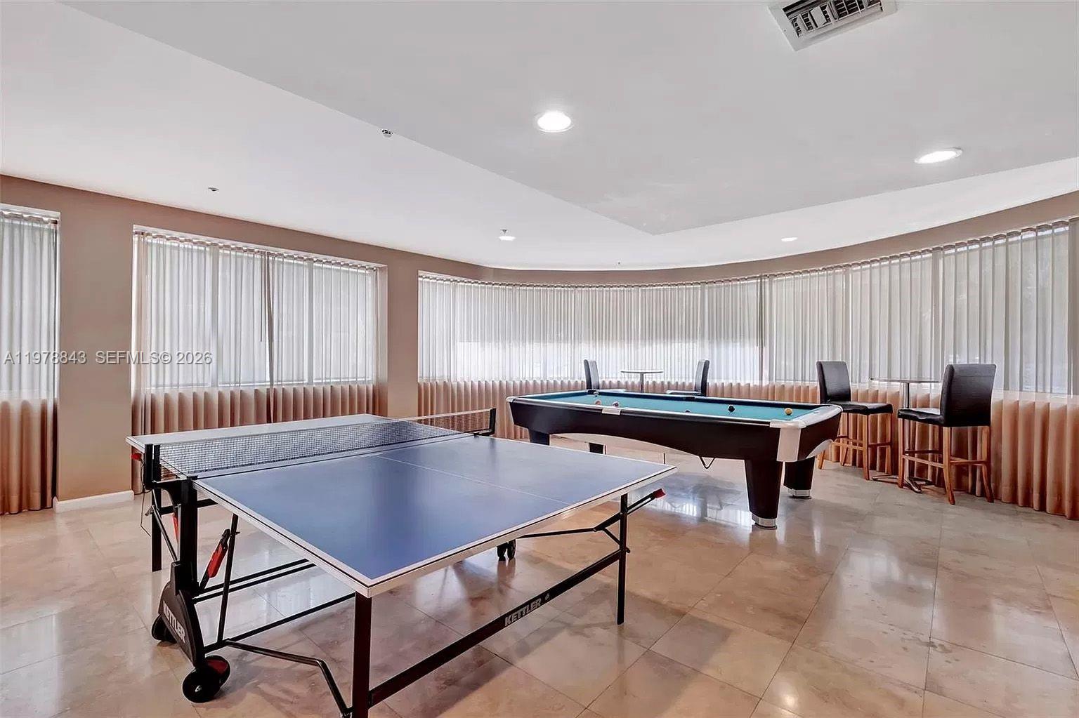 2699 Tigertail Avenue, Unit 14 Miami, FL 33133 - Photo 26 of 28 a room with furniture pool table table tennis pool and windows