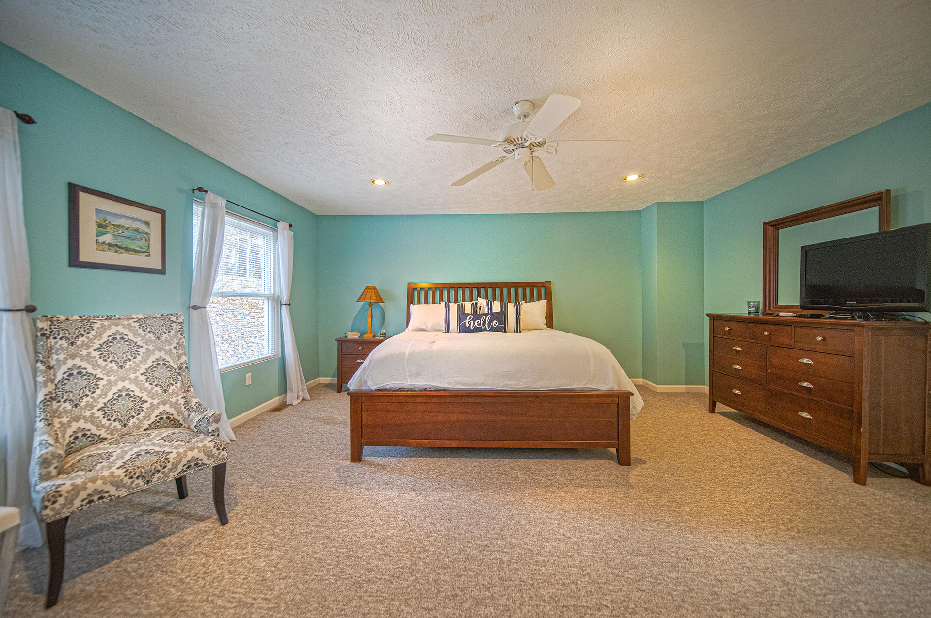 6136 Horseshoe Bend Road Goodview, VA 24095 - Photo 13 of 35 a bedroom with a bed and a flat screen tv