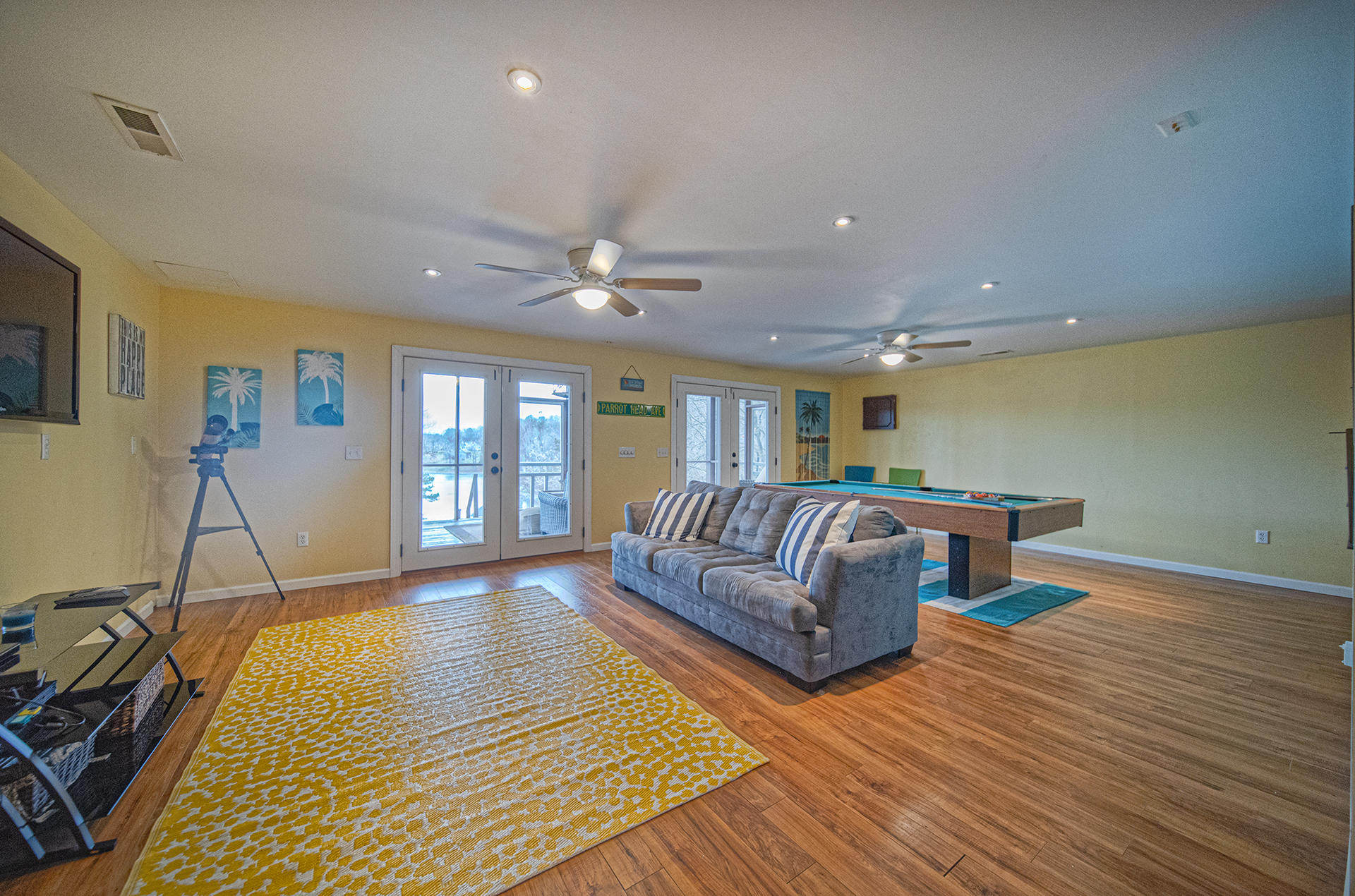 6136 Horseshoe Bend Road Goodview, VA 24095 - Photo 19 of 35 a living room with furniture and a flat screen tv