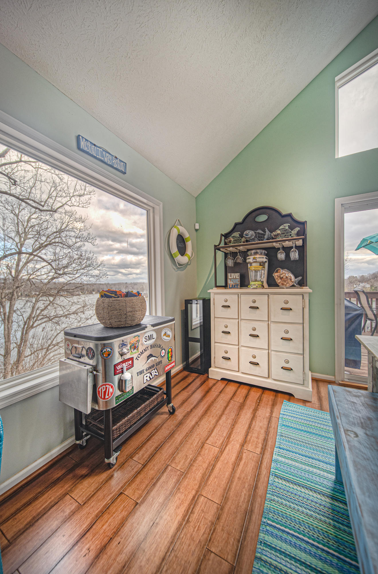 6136 Horseshoe Bend Road Goodview, VA 24095 - Photo 24 of 35 a living room with furniture and a flat screen tv