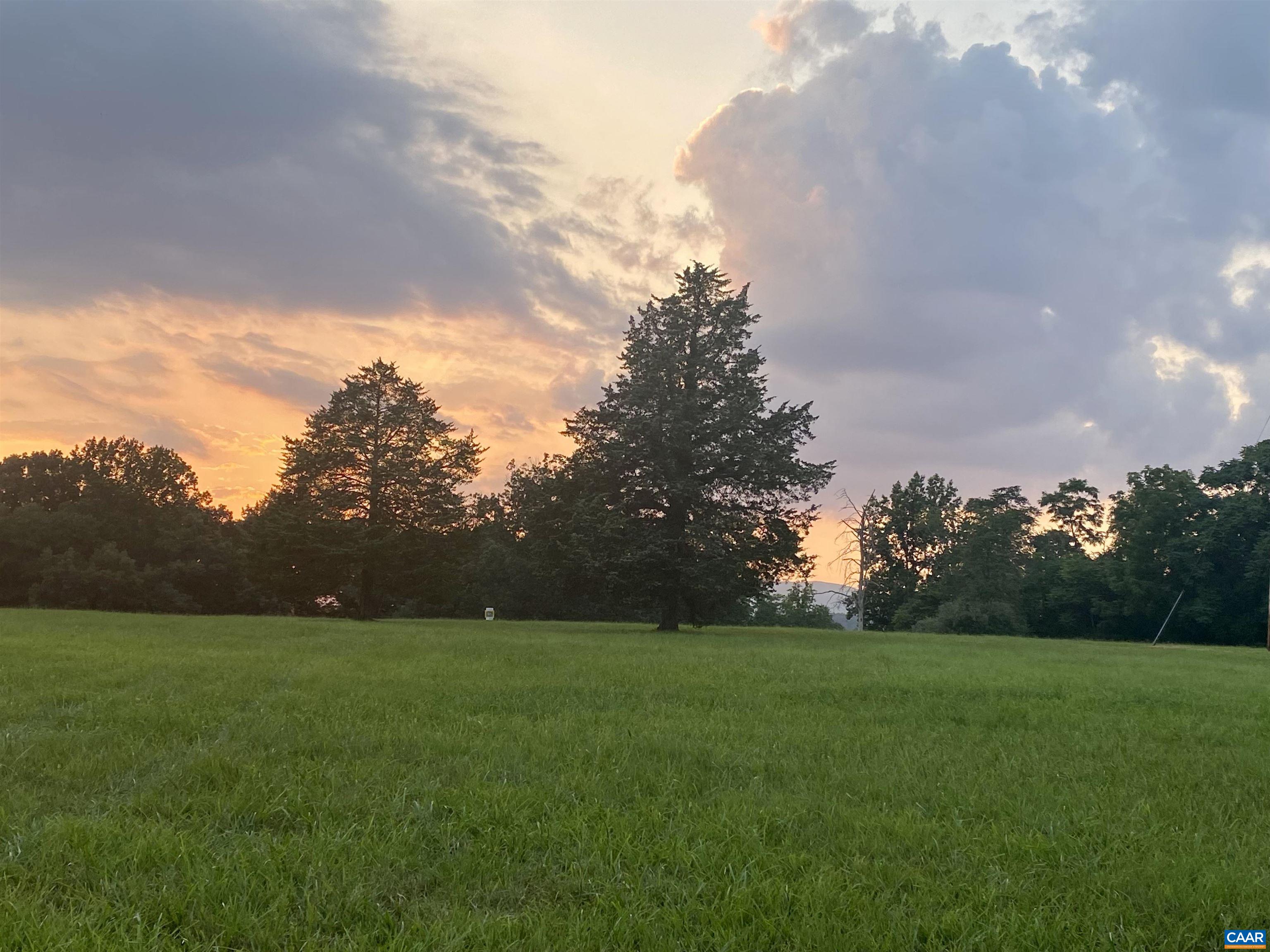 695 Patrick Henry Highway Amherst, VA 24521 - Photo 14 of 16 a view of yard with green space and trampoline
