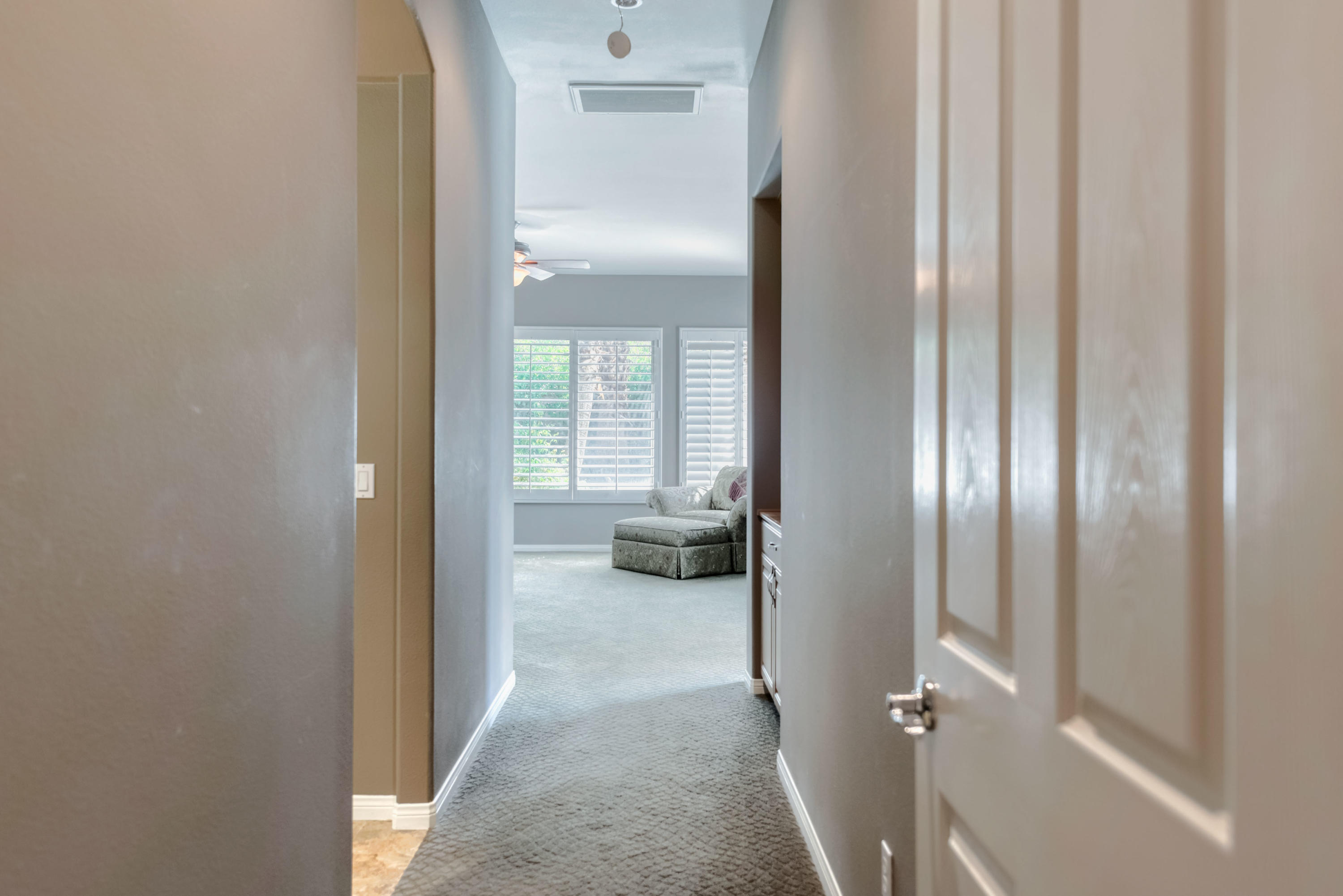 8 Bollinger Road Rancho Mirage, CA 92270 - Photo 22 of 62 8 Bollinger - Primary Bedroom Hallway