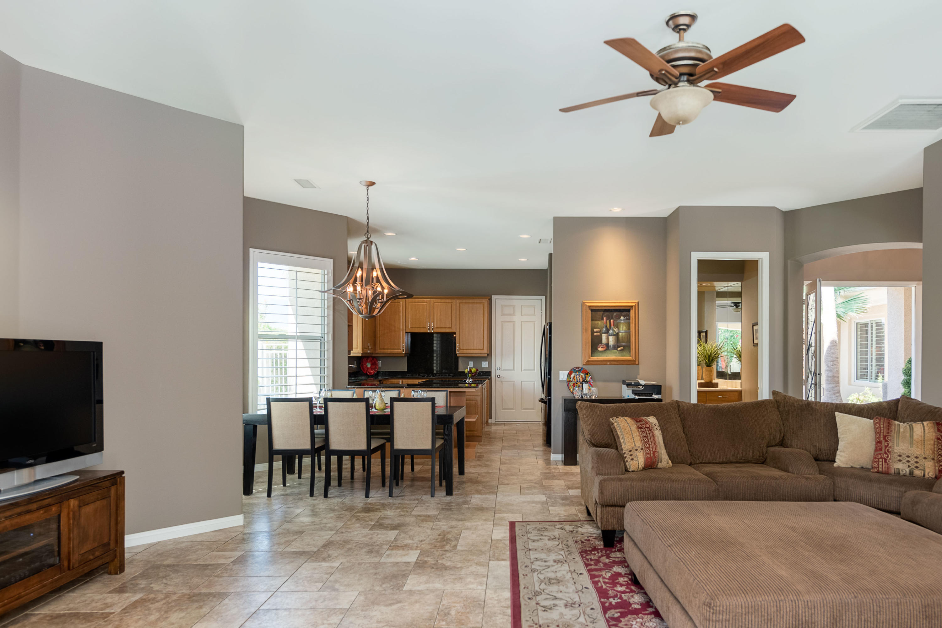 8 Bollinger Road Rancho Mirage, CA 92270 - Photo 8 of 62 8 Bollinger - Family Room and Kitchen 1