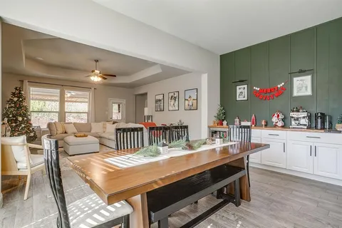 a kitchen with a table and chairs in it