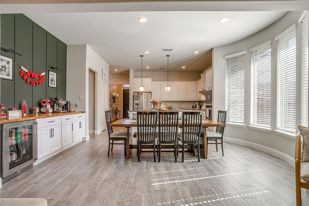 5821 Rendyn Court Midlothian, TX 76065 - Photo 12 of 30 a kitchen with a table and chairs in it