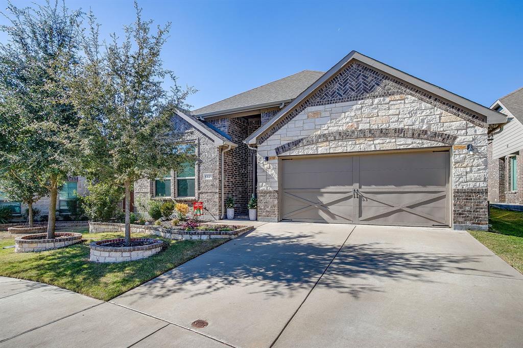 5821 Rendyn Court Midlothian, TX 76065 - Photo 2 of 30 a front view of a house with garden