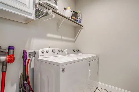 a view of swimming pool with outdoor seating