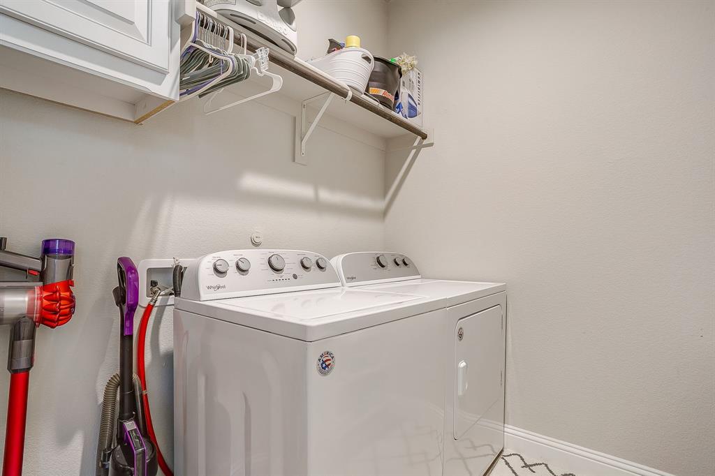 5821 Rendyn Court Midlothian, TX 76065 - Photo 27 of 30 a utility room with dryer and washer