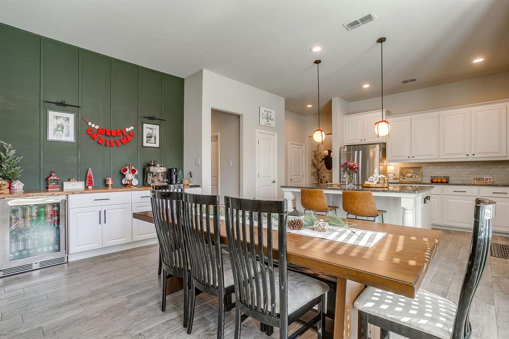 5821 Rendyn Court Midlothian, TX 76065 - Photo 10 of 30 a view of a dining room with furniture