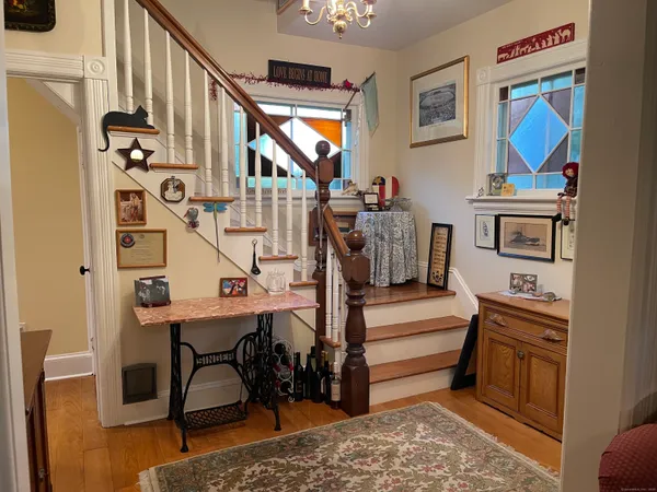 a view of entryway livingroom and hall